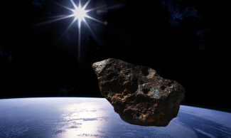 Piirros Maan ohi menevästä asteroidista