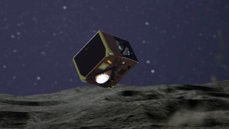 Piirros näyttää MASCOT-laskeutujan lähellä asteroidin pintaa